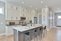 Designer kitchen in the Arrive at Jesperdale Crane showhome.