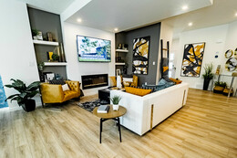 Great room in the Ruby showhome by Bedrock Homes in the Hills at Charlesworth.