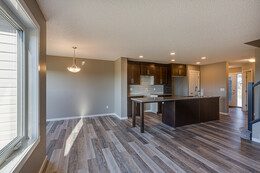 Kitchen in the Wayde Birk model duplex by Bedrock Homes in Red Deer.