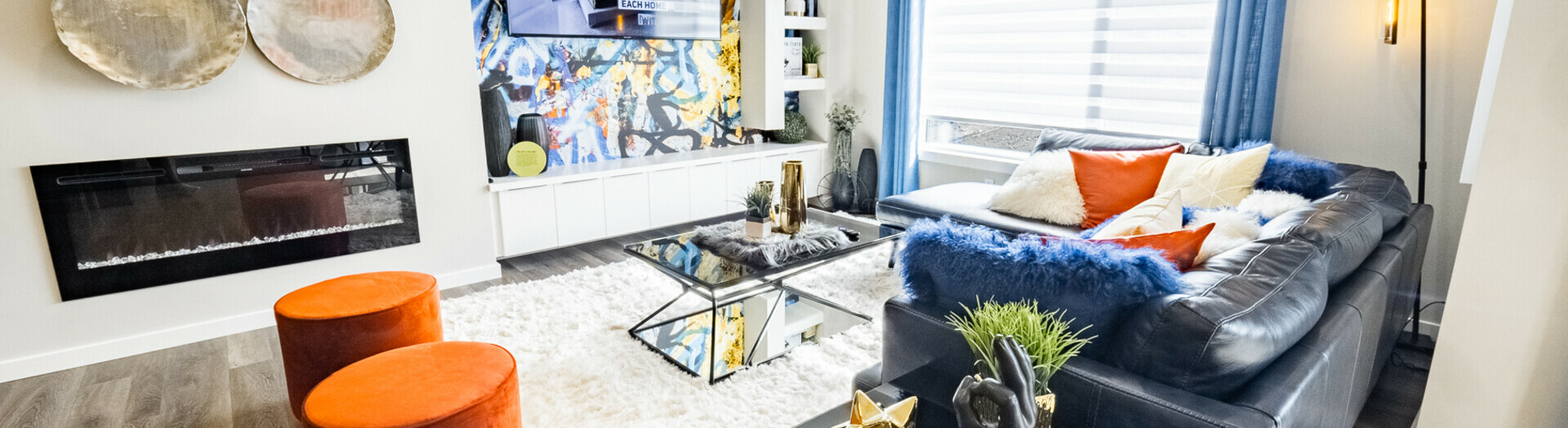 Living room in the Elena showhome in the community of Hills at Charlesworth in Edmonton, Alberta.