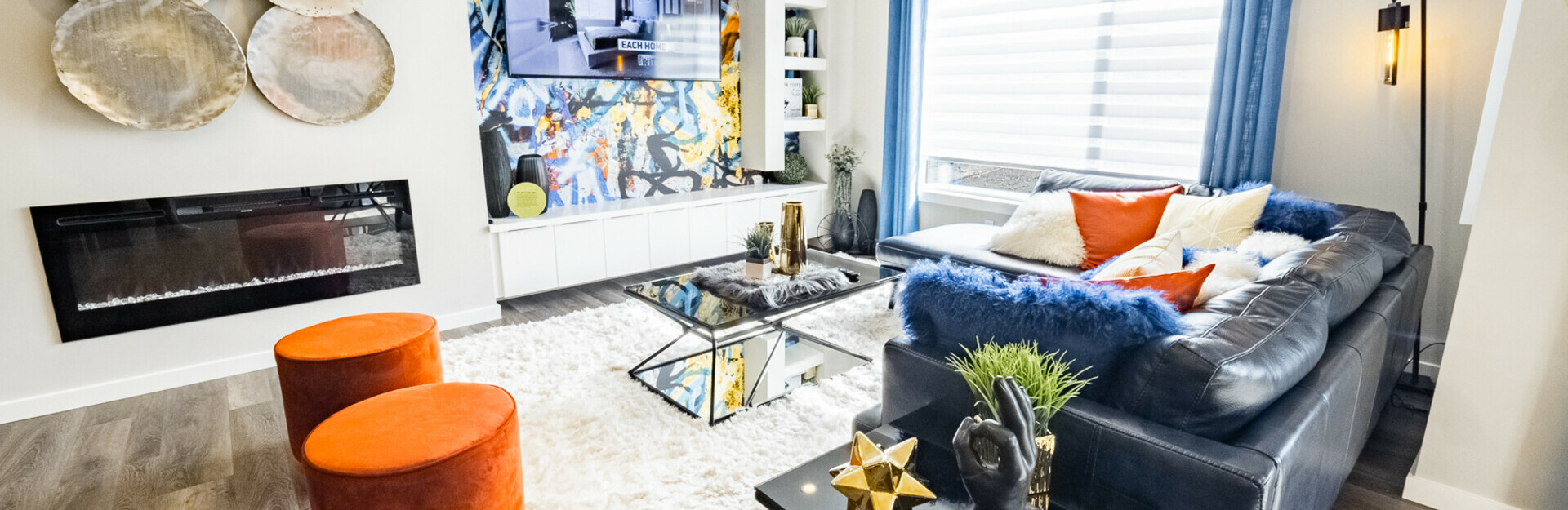 Living room in the Elena showhome in the community of Hills at Charlesworth in Edmonton, Alberta.